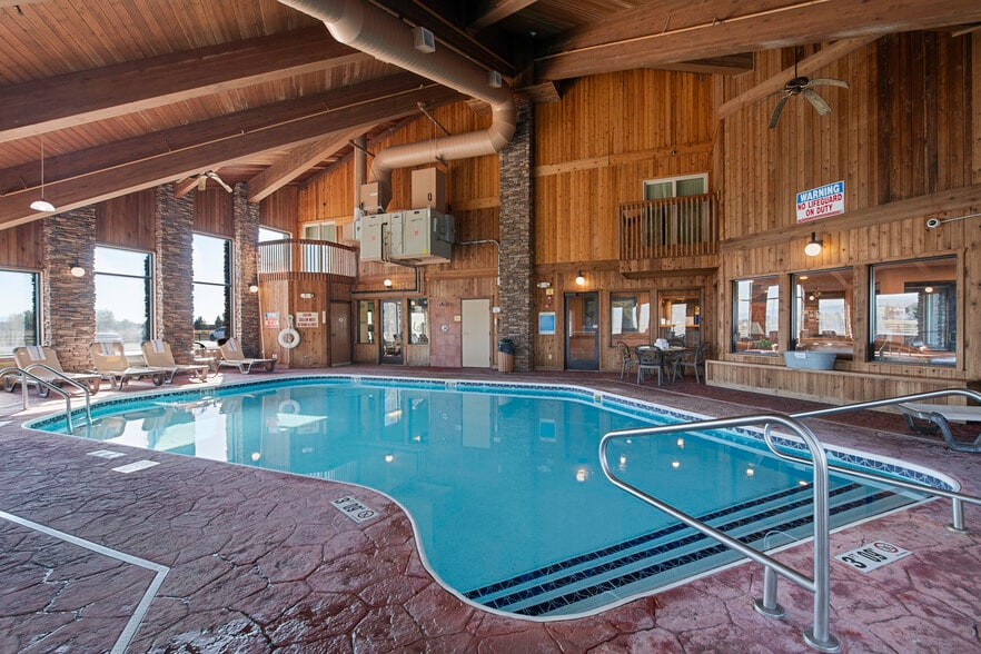Indoor heated pool with vaulted wood ceiling